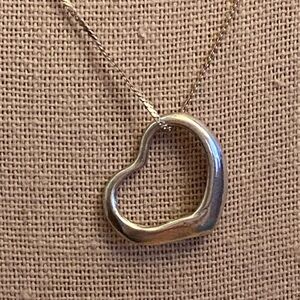 Silver open heart Pendant on a 925 sterling silver serpentine chain